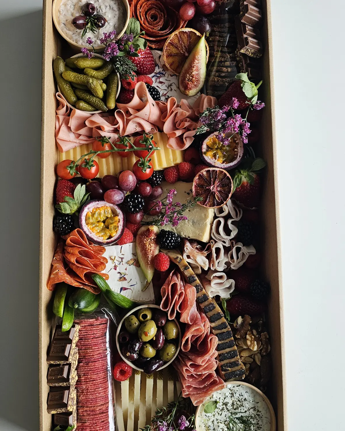 A large grazing box arranged for sharing.