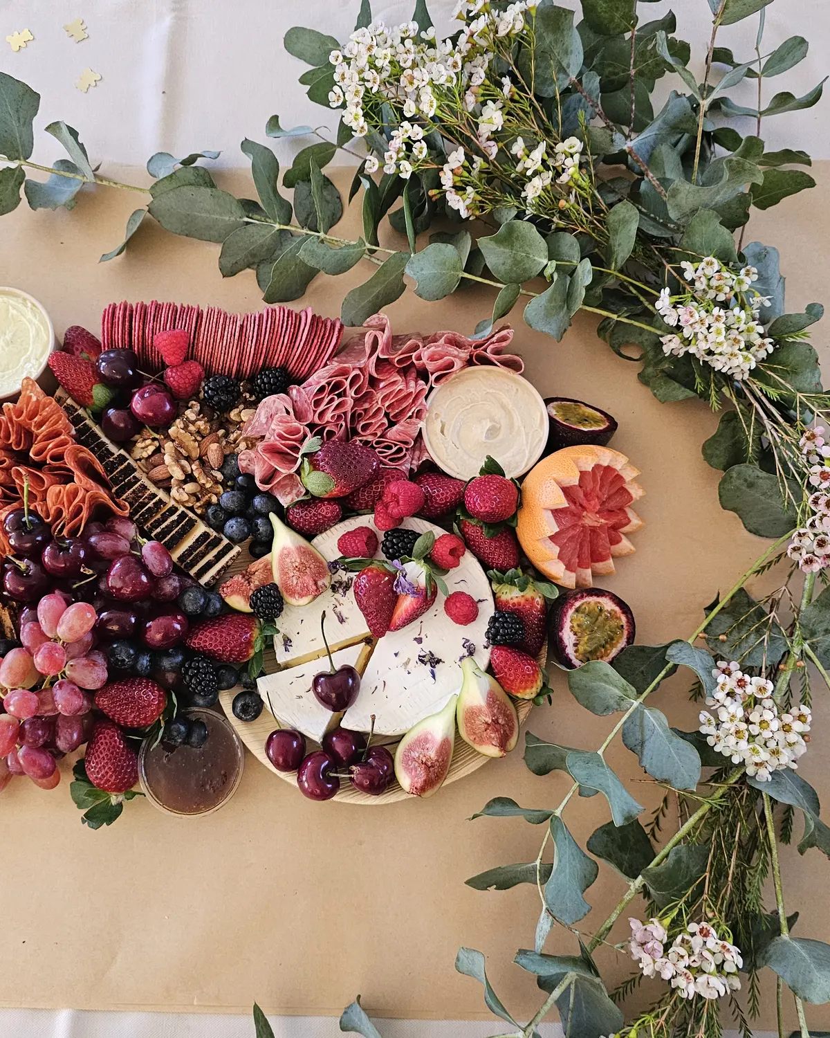 A long grazing table prepared for a celebration.
